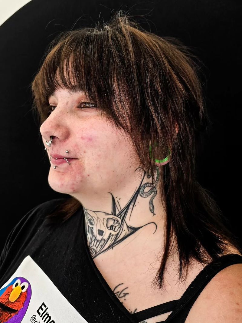 12. Tousled Dark Shag with Piecey Bangs