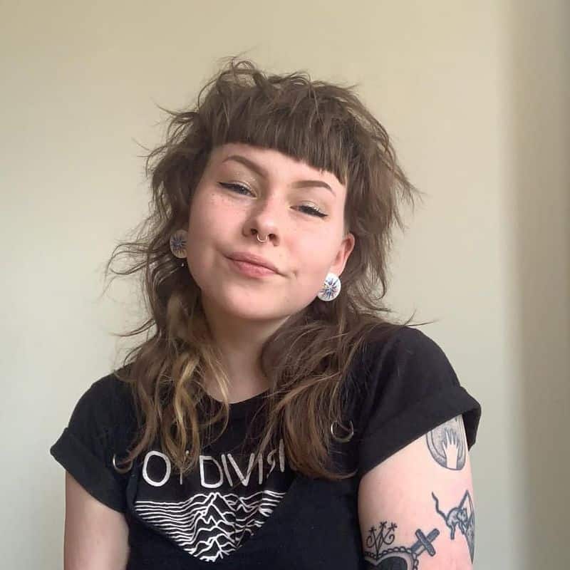 11. Tousled Micro-Bangs and Mullet Shag