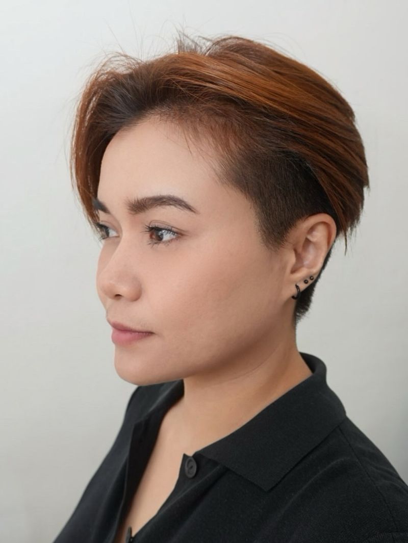 30. Undercut Pixie with Deep Auburn Sweep