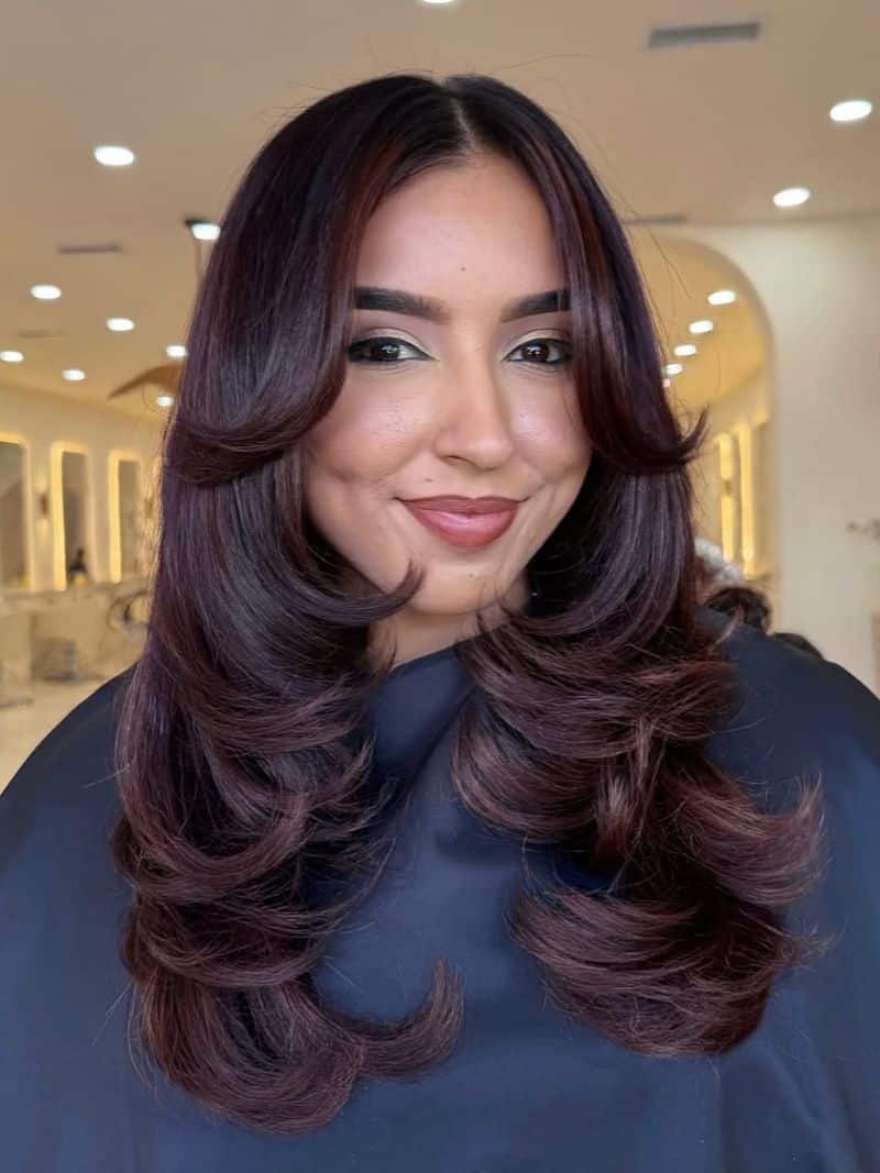 11. Velvet Burgundy Blowout with Bouncy Layers