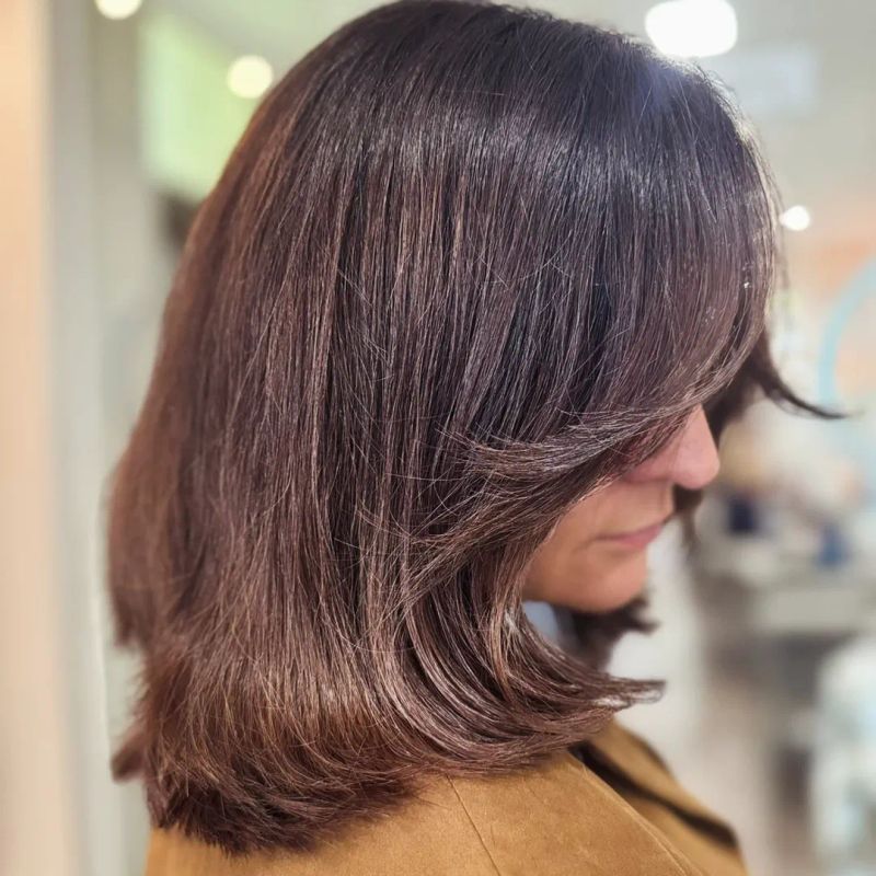 10. Velvet Layered Lob with Sweeping Fringe