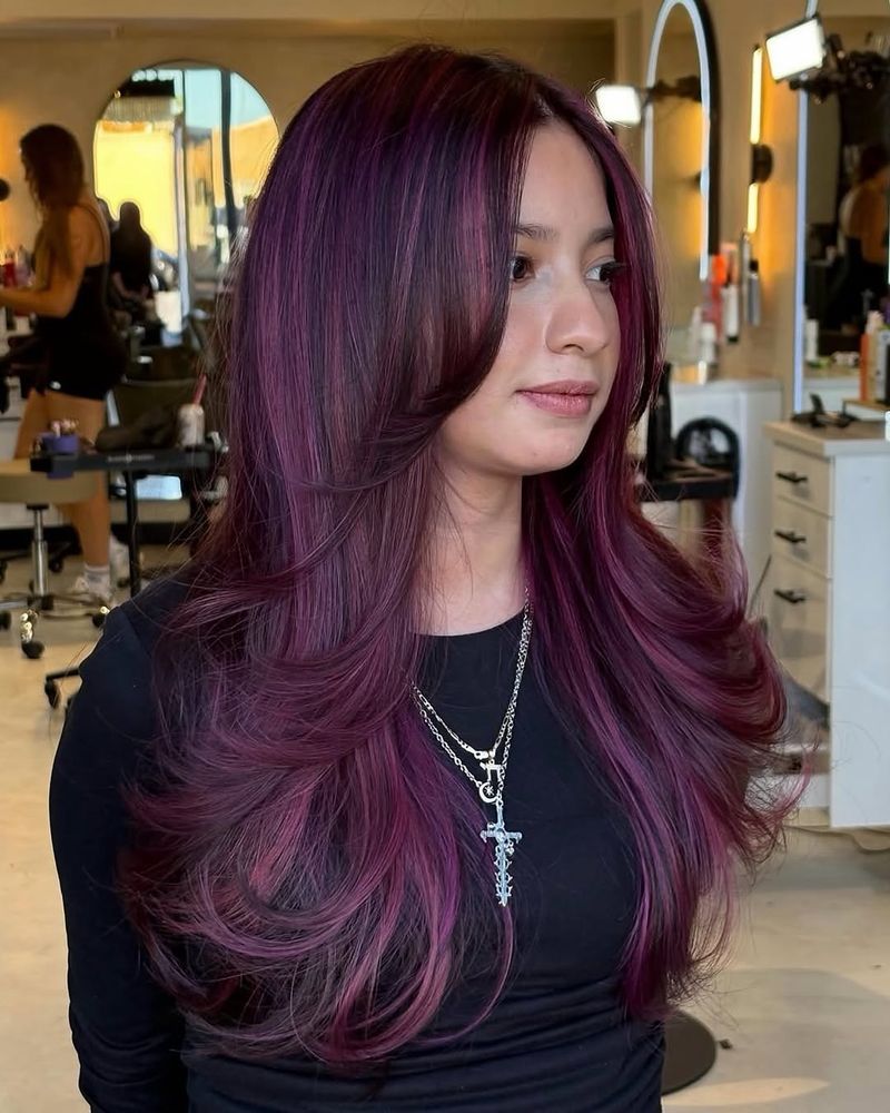 36. Velvet Plum Blowout with Face-Framing Highlights