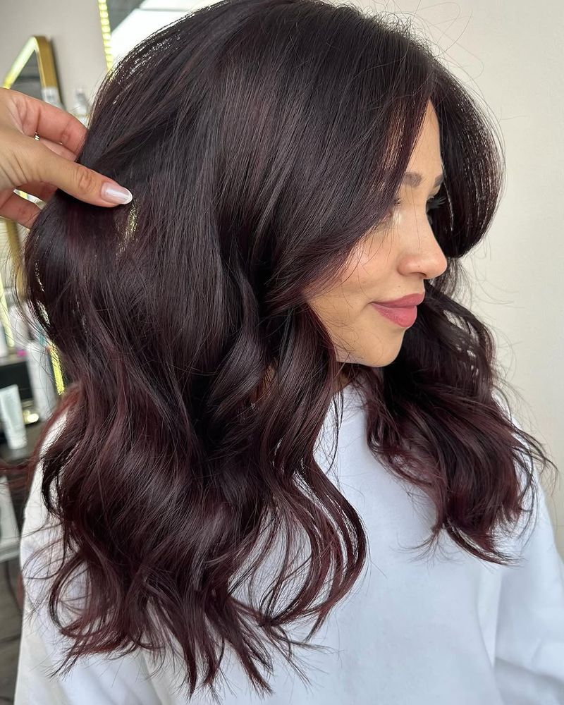 32. Velvet Plum Waves with Curtain Bangs