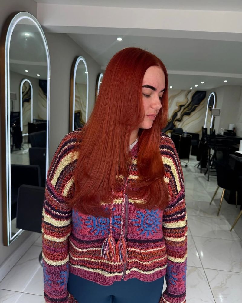 25. Vibrant Copper Red with Long Face-Framing Layers
