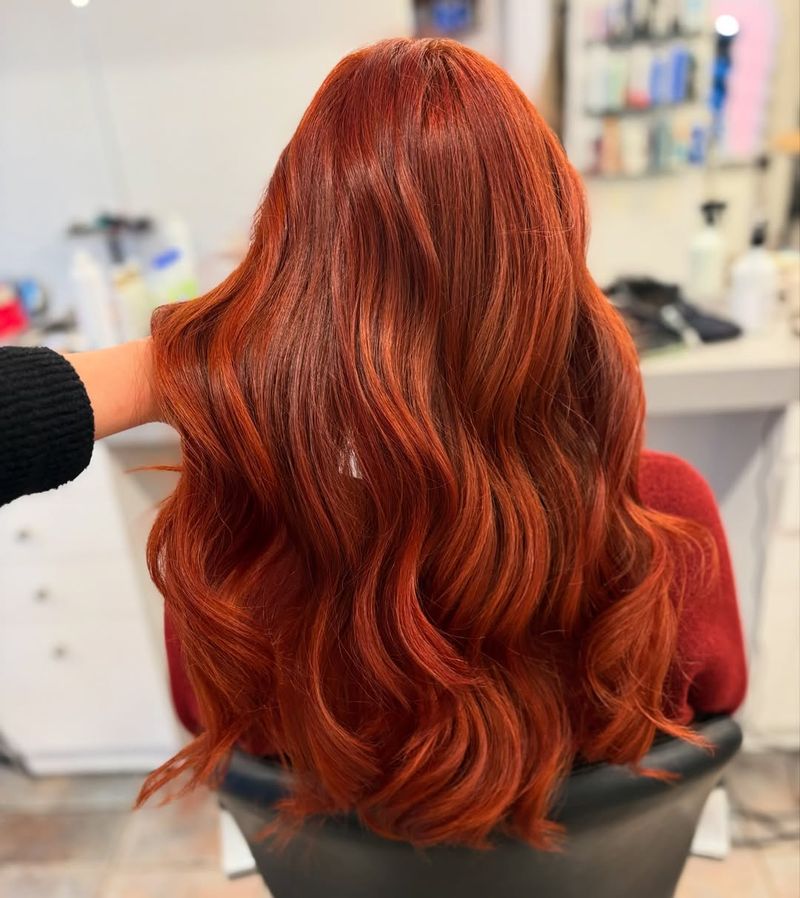 37. Vibrant Glossy Auburn Waves