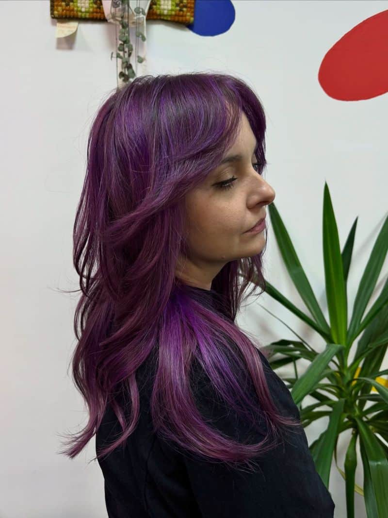 28. Violet Curtain Bangs and Layered Lengths