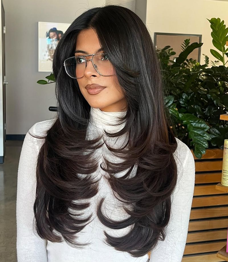 25. Voluminous C-Curl Feathered Layers