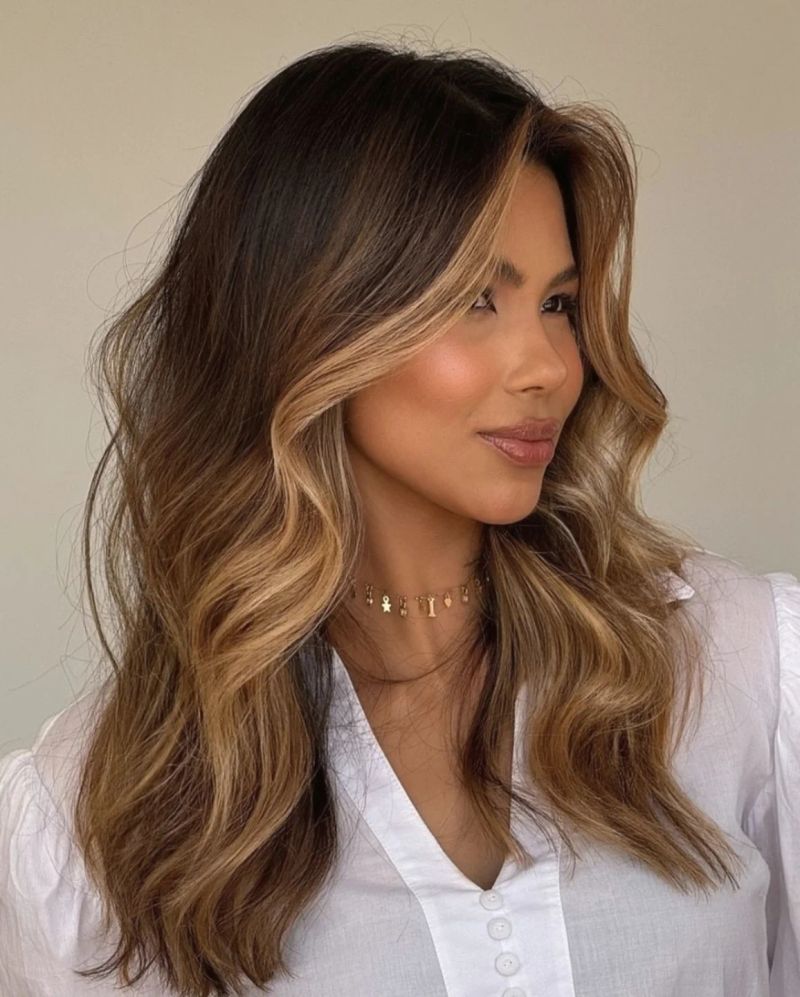 6. Warm Honey and Dark Brunette Waves