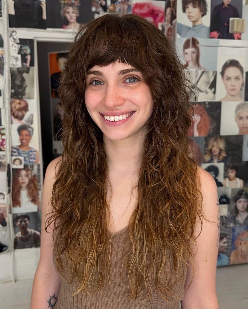 14. Wavy Chestnut Shag with Full Bangs